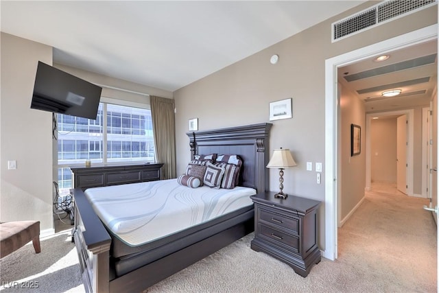 4575 Dean Martin Dr Unit 1112, Las Vegas, NV 89103 - bedroom featuring light carpet and baseboards