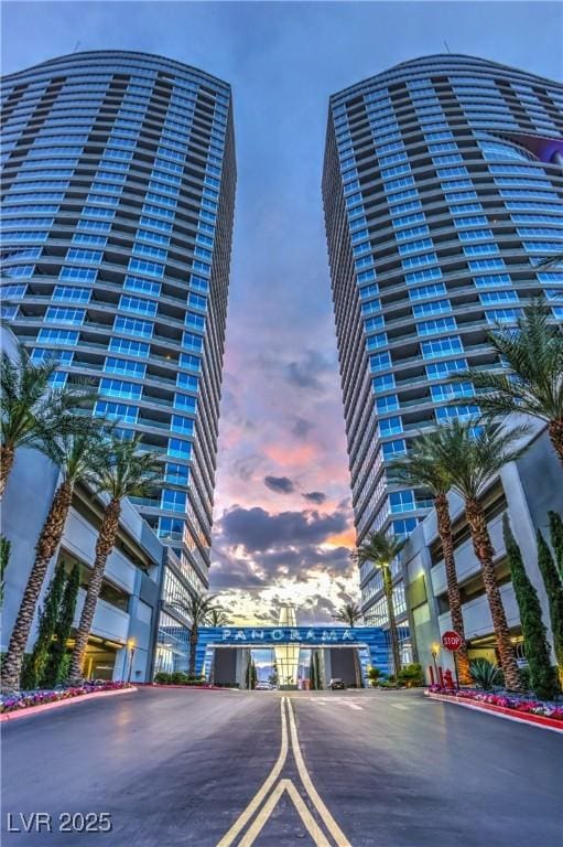 4575 Dean Martin Dr Unit 1112, Las Vegas, NV 89103 - view of property at dusk