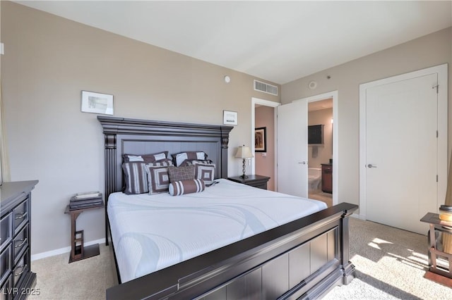 4575 Dean Martin Dr Unit 1112, Las Vegas, NV 89103 - bedroom featuring light carpet and connected bathroom