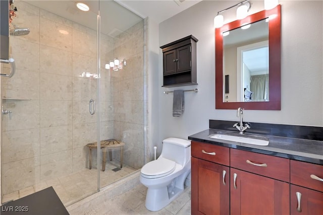 4575 Dean Martin Dr Unit 1112, Las Vegas, NV 89103 - bathroom featuring vanity, a shower stall, and tile patterned flooring