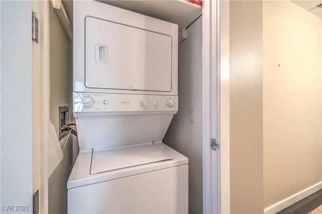 4575 Dean Martin Dr Unit 1112, Las Vegas, NV 89103 - laundry room with stacked washing machine and dryer