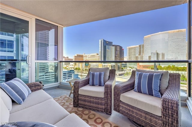 4575 Dean Martin Dr Unit 1112, Las Vegas, NV 89103 - balcony with a city view and an outdoor hangout area