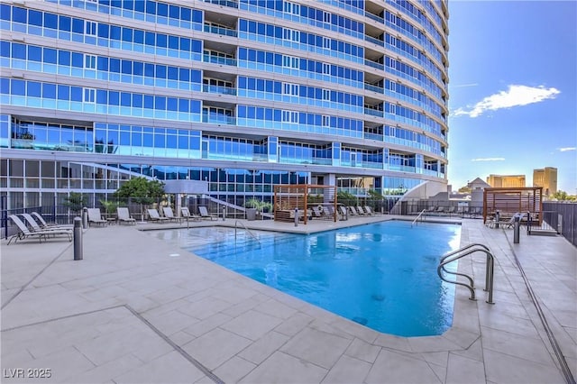 4575 Dean Martin Dr Unit 1112, Las Vegas, NV 89103 - community pool with a patio