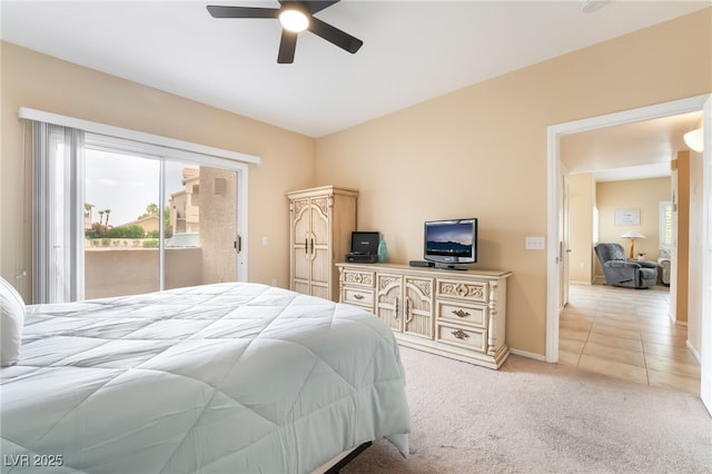 7450 S Eastern Ave Unit 1058, Las Vegas, NV 89123 - bedroom featuring access to outside, light carpet, and a ceiling fan