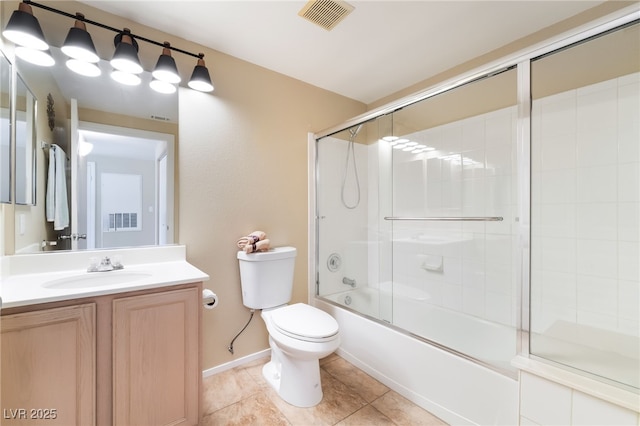 7450 S Eastern Ave Unit 1058, Las Vegas, NV 89123 - full bathroom featuring vanity, combined bath / shower with glass door, and tile patterned flooring