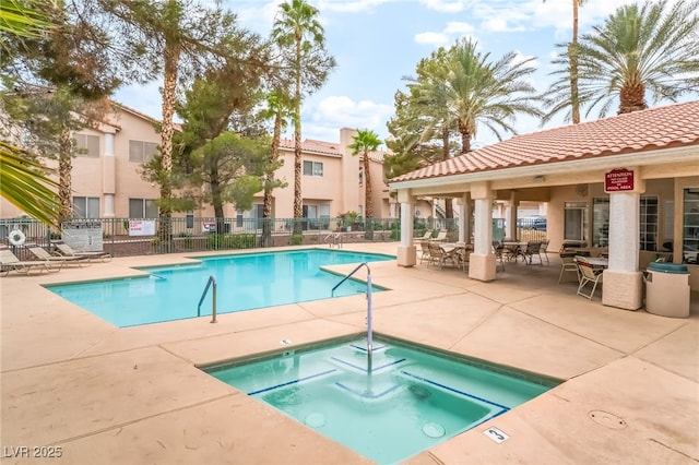 7450 S Eastern Ave Unit 1058, Las Vegas, NV 89123 - community pool featuring a community hot tub and a patio
