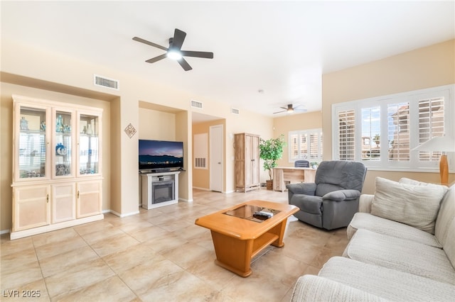 7450 S Eastern Ave Unit 1058, Las Vegas, NV 89123 - living area with a ceiling fan and light tile patterned floors