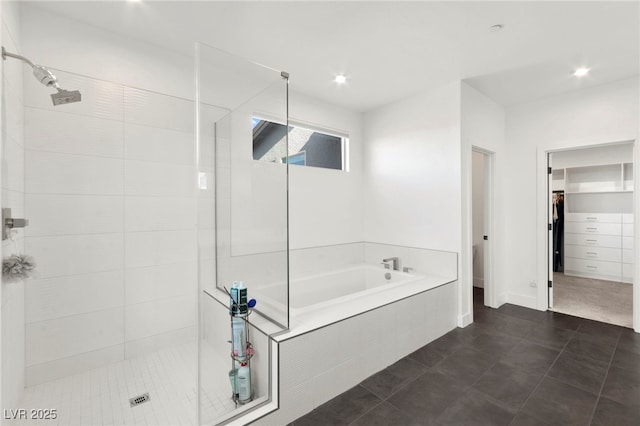 2004 Peaceful Mesa Ct, Henderson, NV 89052 - bathroom featuring a stall shower, a bath, a walk in closet, tile patterned floors, and recessed lighting