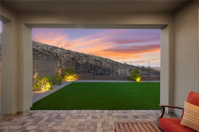 2004 Peaceful Mesa Ct, Henderson, NV 89052 - fenced backyard featuring a patio area