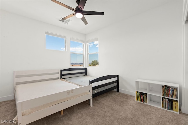 2004 Peaceful Mesa Ct, Henderson, NV 89052 - bedroom with carpet floors and a ceiling fan