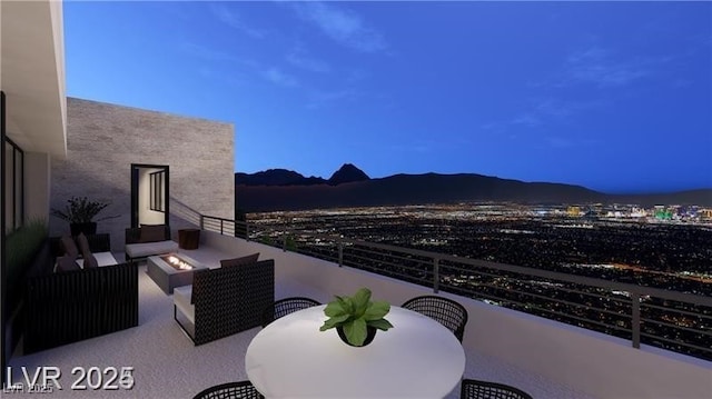 611 Grand Rim Dr, Henderson, NV 89012 - balcony featuring a mountain view and an outdoor living space