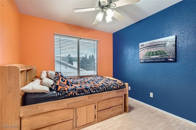 1325 Baychester Dr, Henderson, NV 89002 - bedroom featuring wood finished floors and a ceiling fan