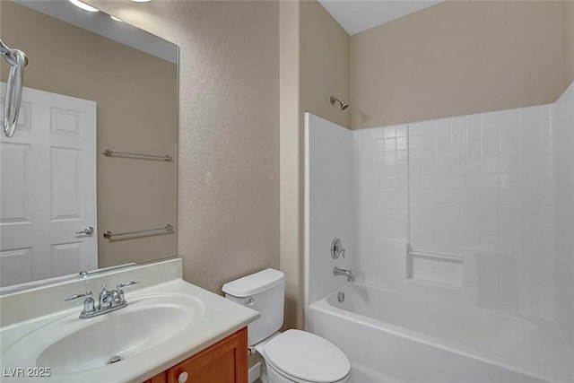 3544 Tack St, Las Vegas, NV 89122 - bathroom with a textured wall, vanity, and shower / tub combination