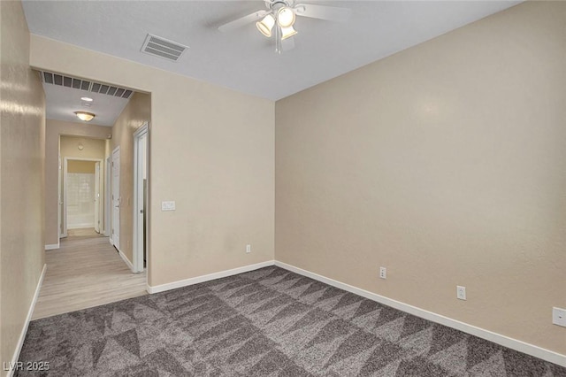 3544 Tack St, Las Vegas, NV 89122 - empty room with dark carpet and ceiling fan