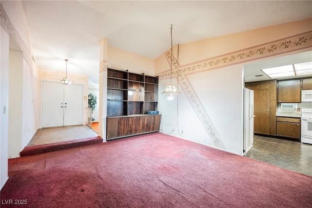 6513 Hyde Ave, Las Vegas, NV 89107 - unfurnished dining area with carpet flooring