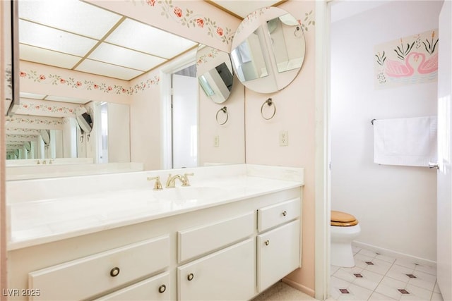 6513 Hyde Ave, Las Vegas, NV 89107 - bathroom featuring vanity and toilet