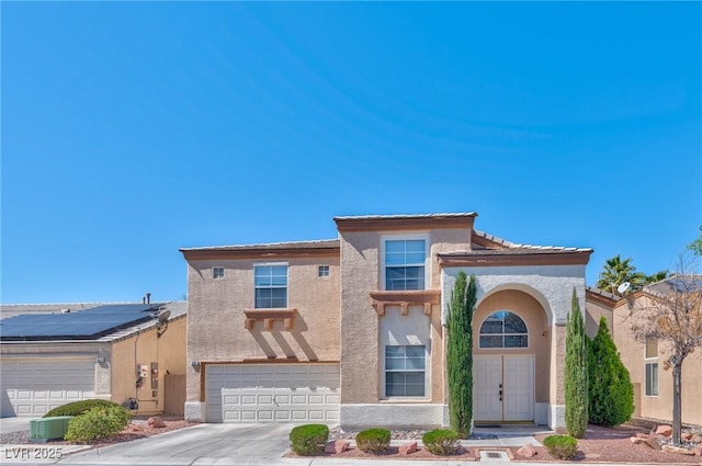 3525 Dover Bay St, Las Vegas, NV 89129 - view of front of house featuring driveway, stucco siding, and an attached garage