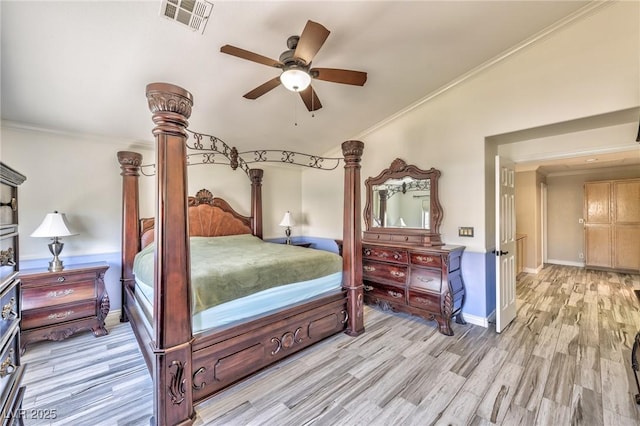 3525 Dover Bay St, Las Vegas, NV 89129 - bedroom with light wood finished floors, crown molding, and a ceiling fan