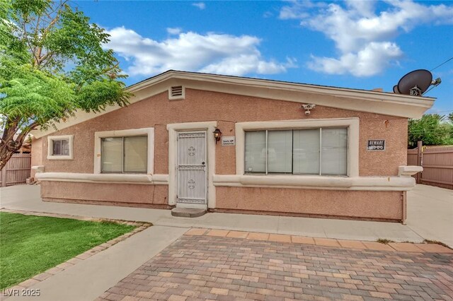 75 N 27th St, Las Vegas, NV 89101 - view of front of house with stucco siding