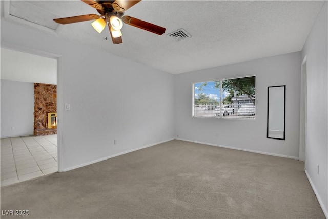 75 N 27th St, Las Vegas, NV 89101 - carpeted spare room featuring a ceiling fan and a textured ceiling