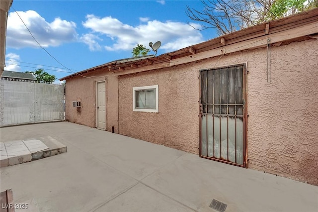 75 N 27th St, Las Vegas, NV 89101 - view of patio with an AC wall unit