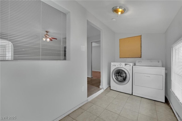 75 N 27th St, Las Vegas, NV 89101 - laundry area with washer and dryer, a ceiling fan, and light tile patterned floors