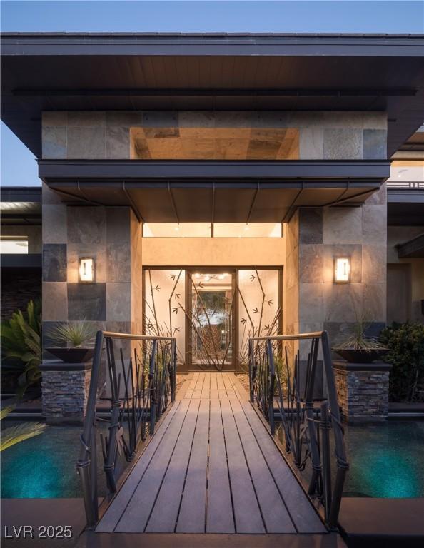 17 Soaring Bird Ct, Las Vegas, NV 89135 - property entrance with an outdoor pool and a porch
