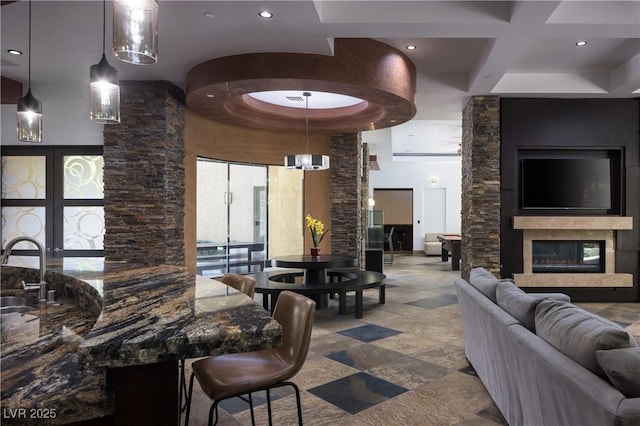 17 Soaring Bird Ct, Las Vegas, NV 89135 - building lobby with coffered ceiling, recessed lighting, beam ceiling, and a high ceiling
