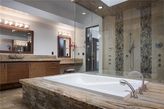 17 Soaring Bird Ct, Las Vegas, NV 89135 - bathroom with a garden tub, a stall shower, and vanity