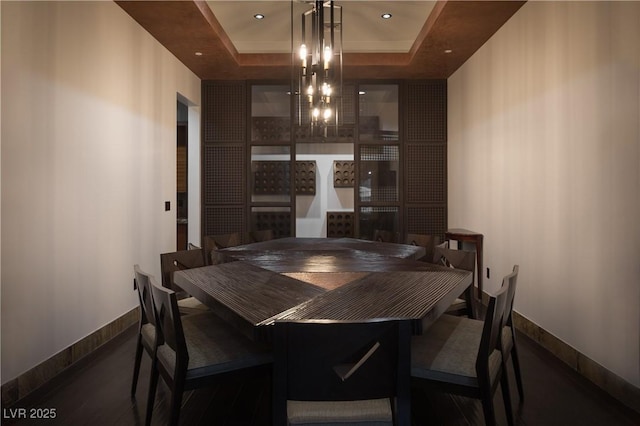 17 Soaring Bird Ct, Las Vegas, NV 89135 - dining room featuring a tray ceiling and a chandelier