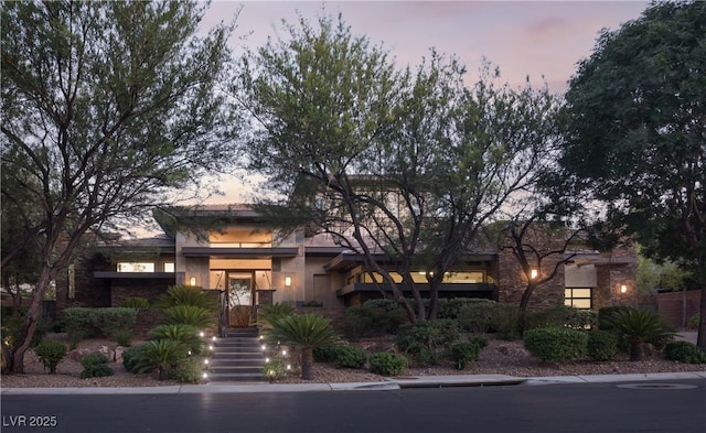 17 Soaring Bird Ct, Las Vegas, NV 89135 - view of front of property with stucco siding and stone siding
