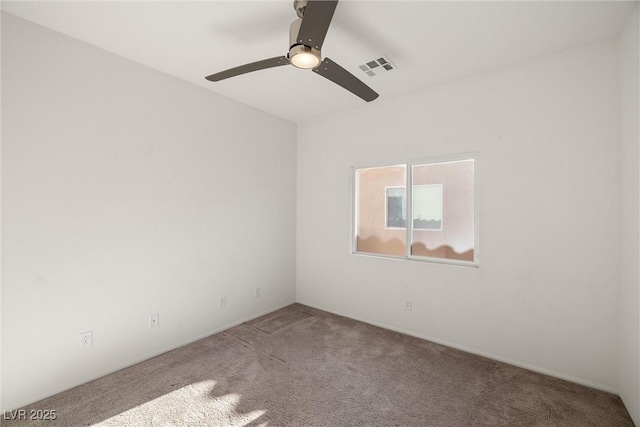 5338 Lignum Ave, Pahrump, NV 89061 - carpeted spare room with a ceiling fan