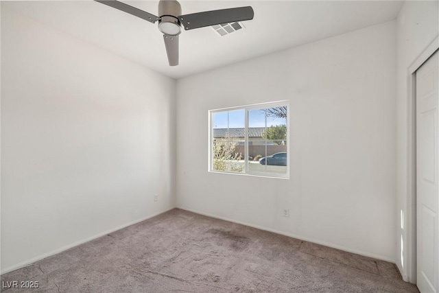5338 Lignum Ave, Pahrump, NV 89061 - unfurnished bedroom with carpet flooring, ceiling fan, and a closet