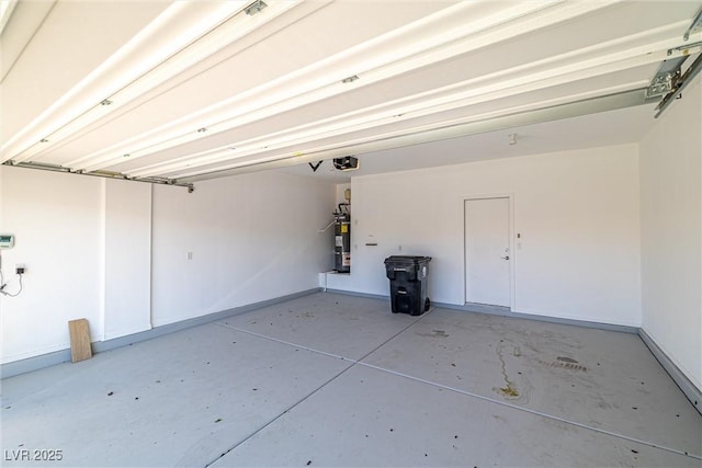 5338 Lignum Ave, Pahrump, NV 89061 - garage featuring secured water heater and a garage door opener