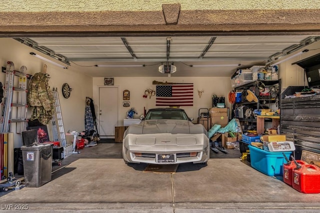 5028 Crying Heart St, North Las Vegas, NV 89031 - garage featuring a garage door opener