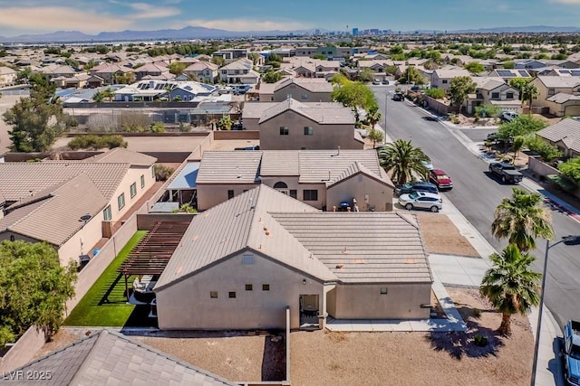 5028 Crying Heart St, North Las Vegas, NV 89031 - aerial view of residential area featuring a mountainous background