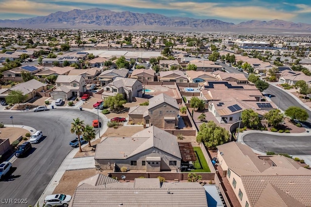 5028 Crying Heart St, North Las Vegas, NV 89031 - aerial perspective of suburban area with mountains
