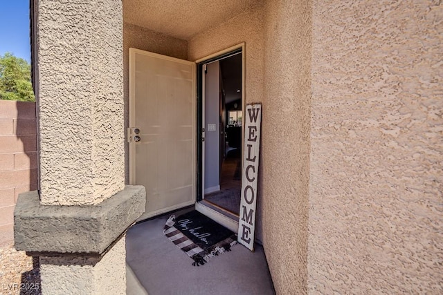 5028 Crying Heart St, North Las Vegas, NV 89031 - view of exterior entry with stucco siding
