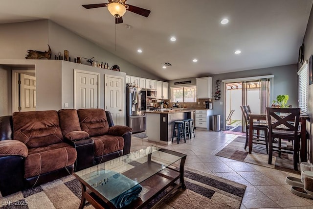 5028 Crying Heart St, North Las Vegas, NV 89031 - living room featuring vaulted ceiling, ceiling fan, and recessed lighting