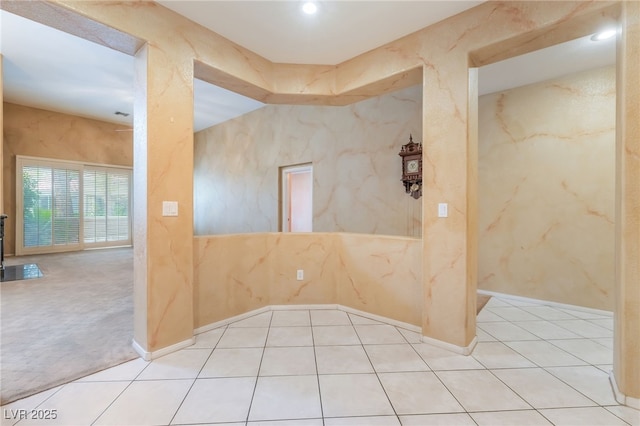 10037 Summer Oak Ln Unit 102, Las Vegas, NV 89134 - empty room featuring a wood stove, tile patterned floors, and recessed lighting