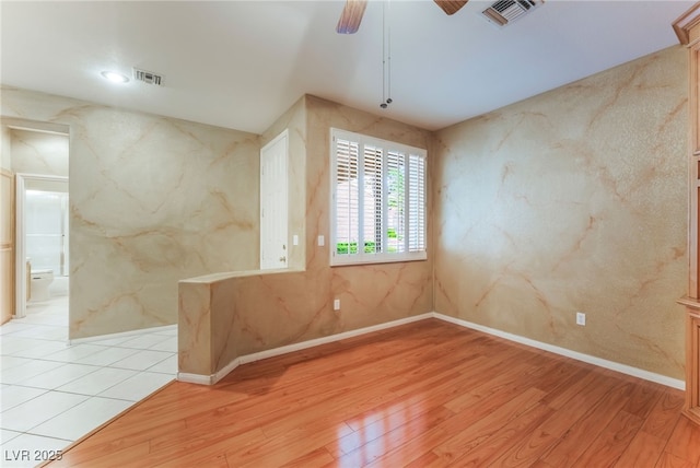 10037 Summer Oak Ln Unit 102, Las Vegas, NV 89134 - empty room with light wood-style flooring and ceiling fan