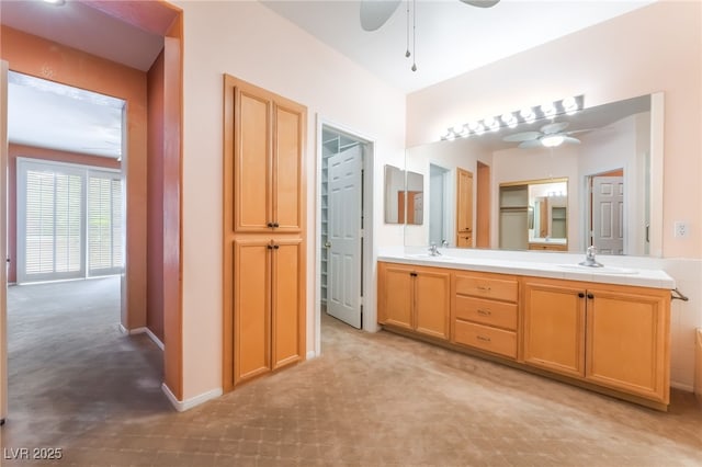 10037 Summer Oak Ln Unit 102, Las Vegas, NV 89134 - full bathroom with a ceiling fan and double vanity