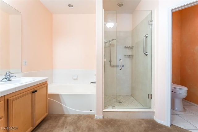 10037 Summer Oak Ln Unit 102, Las Vegas, NV 89134 - full bath featuring vanity, a stall shower, a bath, and tile patterned floors