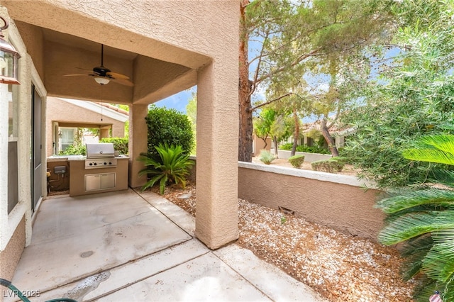 10037 Summer Oak Ln Unit 102, Las Vegas, NV 89134 - view of patio / terrace with an outdoor kitchen and ceiling fan