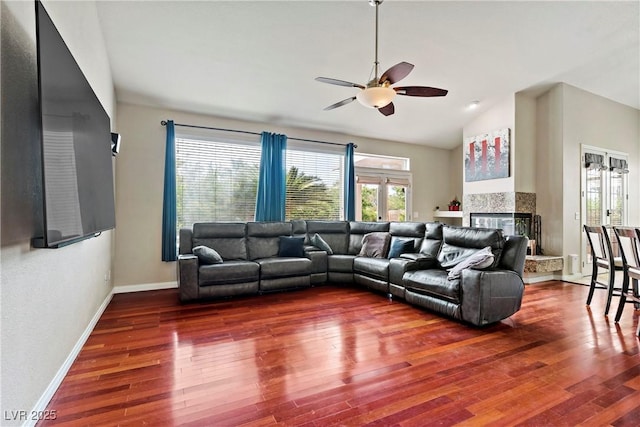 2010 Catalina Marie Ave, Henderson, NV 89074 - living area with ceiling fan, wood finished floors, a multi sided fireplace, and high vaulted ceiling