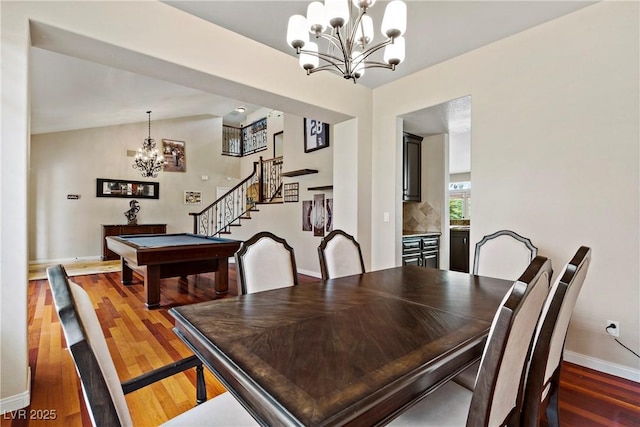 2010 Catalina Marie Ave, Henderson, NV 89074 - dining area featuring a chandelier, stairs, wood finished floors, billiards table, and vaulted ceiling