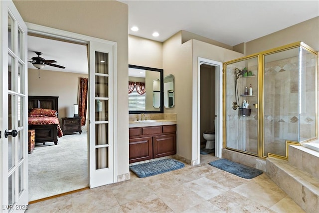 2010 Catalina Marie Ave, Henderson, NV 89074 - full bathroom with french doors, connected bathroom, vanity, and recessed lighting