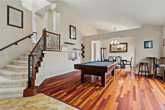 2010 Catalina Marie Ave, Henderson, NV 89074 - recreation room featuring hardwood / wood-style floors, billiards, a chandelier, and vaulted ceiling