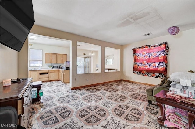 5907 Zawawi Ct, Las Vegas, NV 89110 - living area featuring baseboards