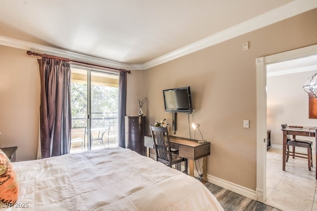 230 E Flamingo Rd Unit 203, Las Vegas, NV 89169 - bedroom with crown molding, access to exterior, and wood finished floors